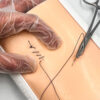 Two-layer skin for suturing