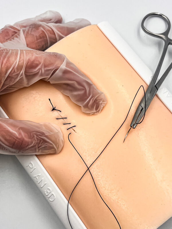 Two-layer skin for suturing