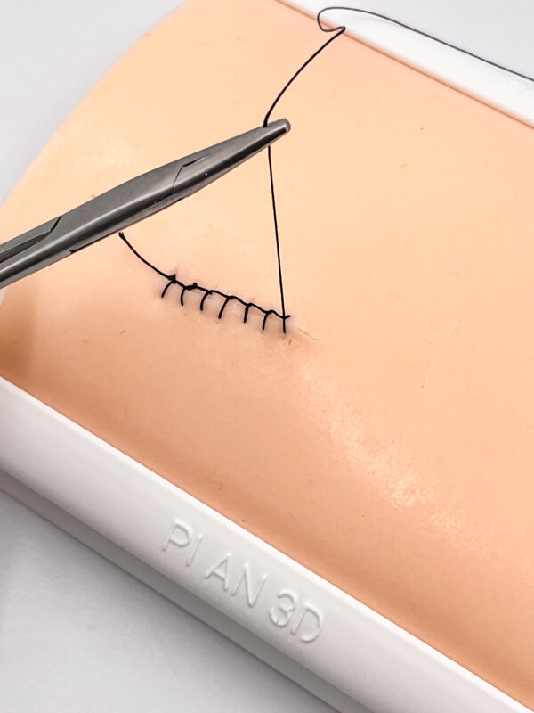 Two-layer skin for suturing
