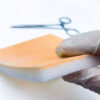 Two-layer skin for suturing
